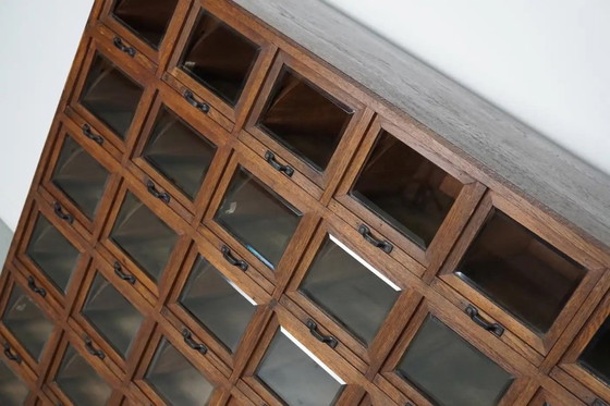 Image 1 of Mobiletto antico tedesco in rovere per merceria, anni '20/'30