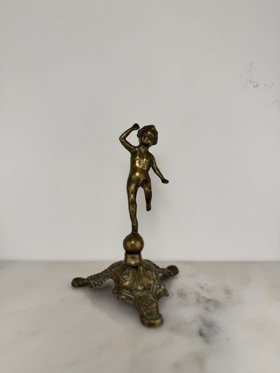 Image 1 of Antique bronze figurine of playing child - decorative and rare