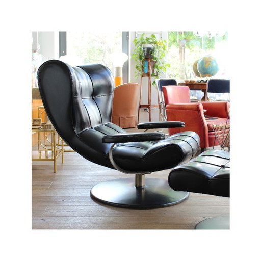 Fauteuil met poef