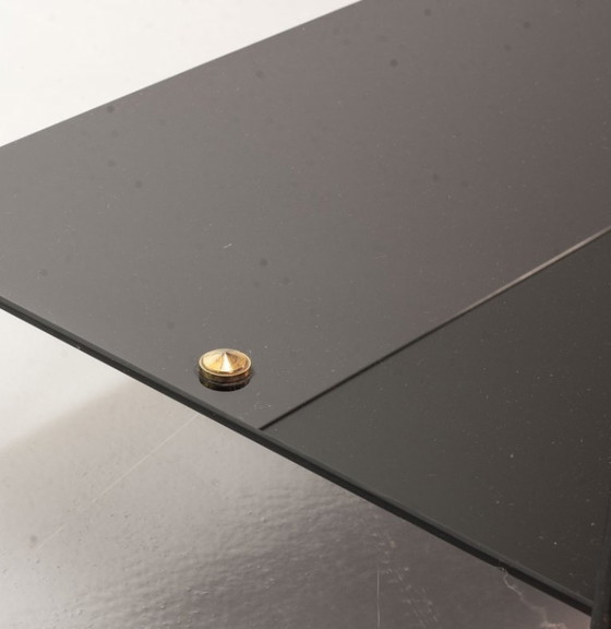 Image 1 of Mid-Century Pierre Guariche Glass Coffee / Side Table for Airborne in Black Steel with Brass Magazine Holder. France, 1950s. 