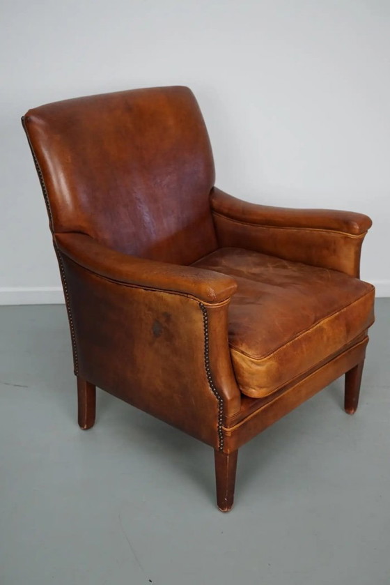 Image 1 of Vintage Nederlandse clubfauteuil van cognackleurig leer
