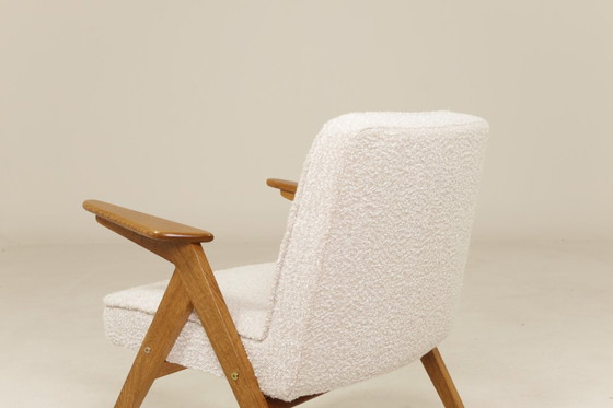 Image 1 of Fauteuil vintage chêne rustique pearl bouclé conclu par Chierowski 