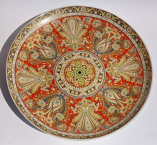 Large Chinese decorative plate with traditional Middle Eastern and Islamic patterns.