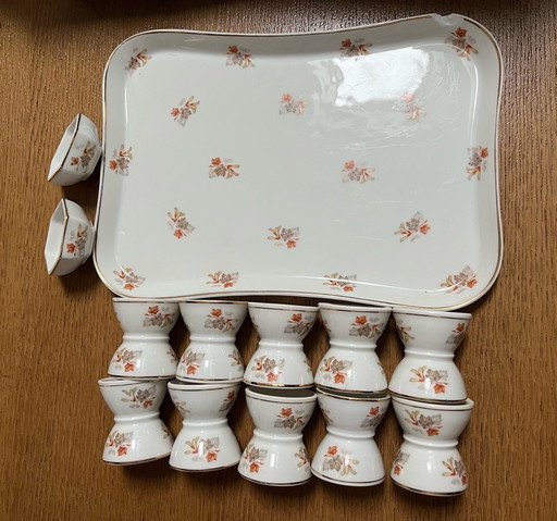 10 Diabolo Egg cups, 2 Salerons and Serving tray in Limoges Porcelain