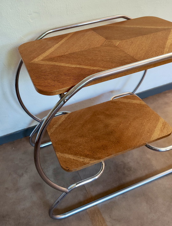 Image 1 of Mesa auxiliar Art Decó / Bauhaus - estructura tubular y tablero chapado