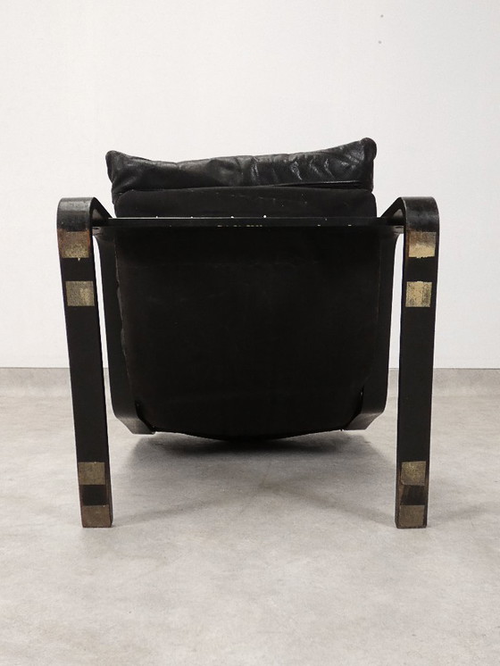 Image 1 of  high-back lounge chair in black leather