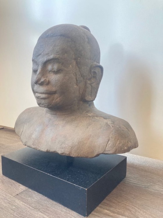 Image 1 of Sandstone bust of King Jayavarman VII of the Khmer Empire.