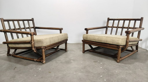 Vintage rattan lounge chairs by McGuire