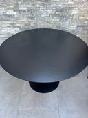 Round black wooden table with metal base juntoo