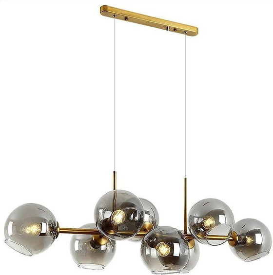 Image 1 of Dining room chandelier Illuminate your dining room with this modern chandelier composed of seven smoked glass globes. Its refine