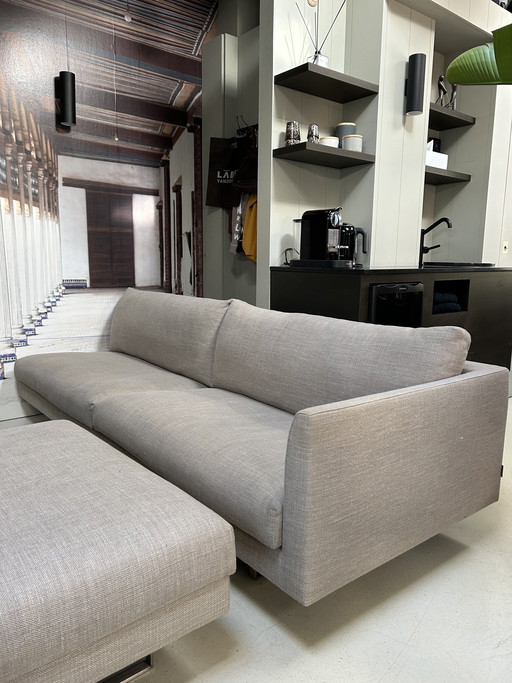 Montis Axel 4-zits bank met 1 armleuning en bijpassende hocker