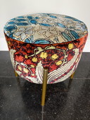 Tabouret upcyclé tapissé de tissu design