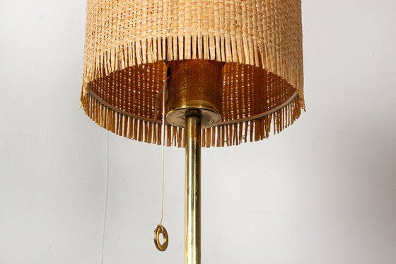 Image 1 of Lampadaire Suédois en Laiton, pied en fonte, modèle G 019 par Bergboms 1960.
