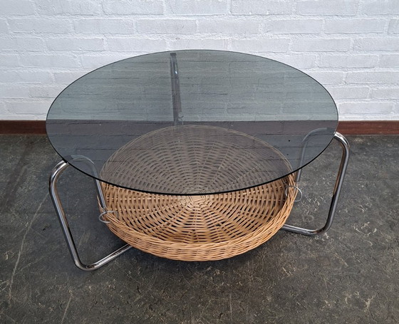 Image 1 of vintage round coffee table with glass top and wicker magazine basket