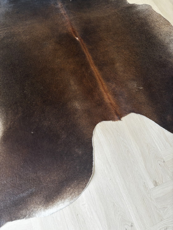 Image 1 of Mooi donkerbruin vloerkleed van koevel