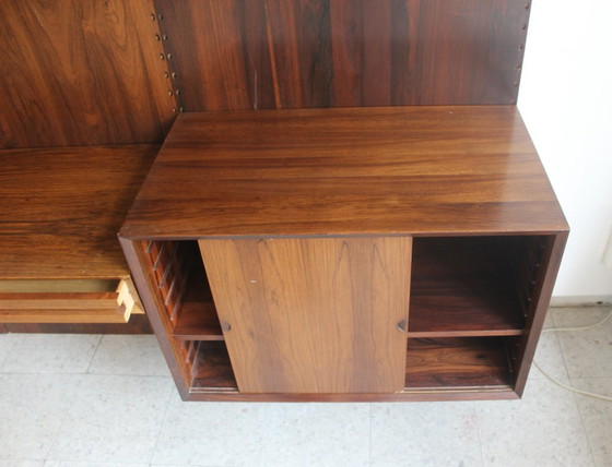 Mueble de pared en palisandro, de Poul Cadovius para Cado, Dinamarca. – Estanterías de pared, Wood (photo 14 of 17)