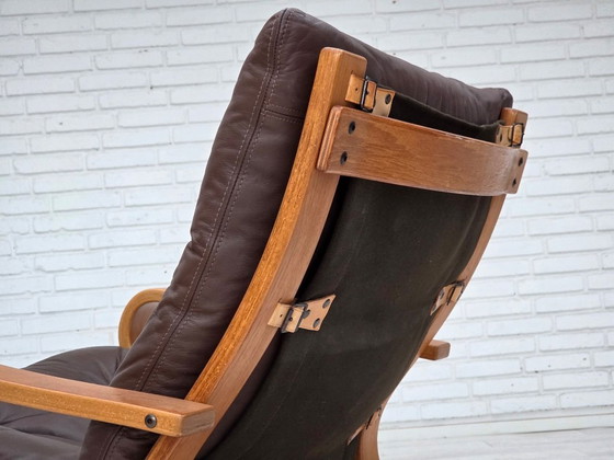 Image 1 of Fauteuil danois des années 1970 de la marque Komfort, cuir, toile et bois courbé.