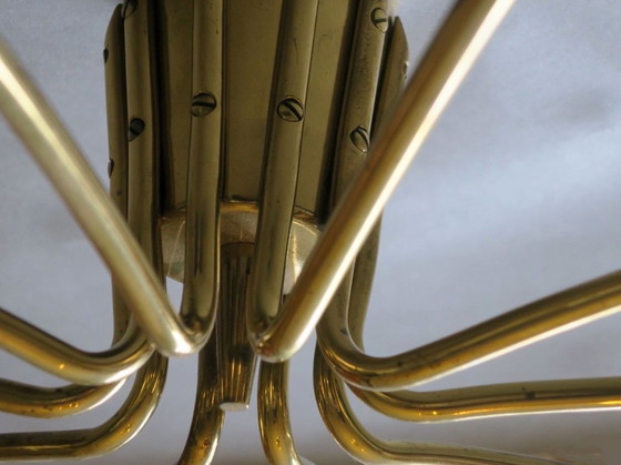 Image 1 of Elliptische kroonluchter met 10 armen van messing en glas, jaren 1950