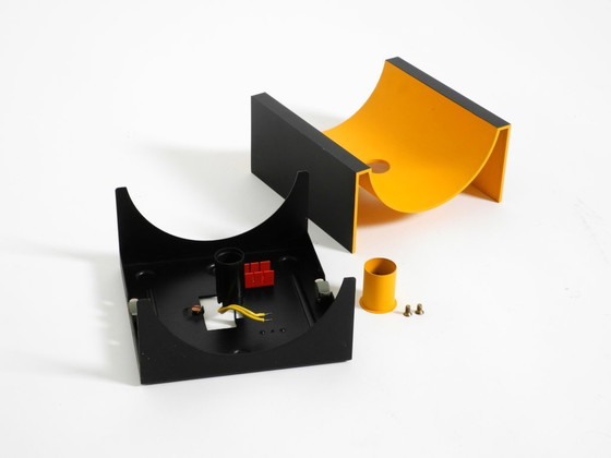 Image 1 of A rare pair of original 1960s Space Age metal wall lamps by Klaus Hempel for Kaiser Leuchten in yellow and black