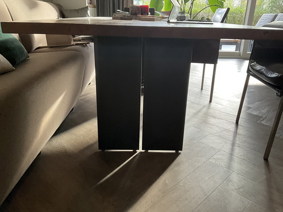 Image 1 of Natura dining table in walnut with black knots