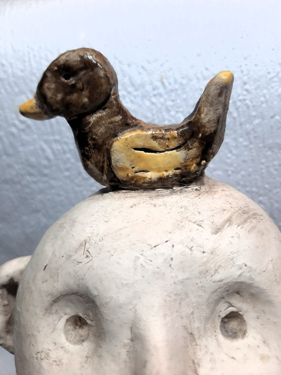 Image 1 of (W006) Unique Folk Art Ceramic Sculpture – "The Happy Bald Man with a Duck on His Head"