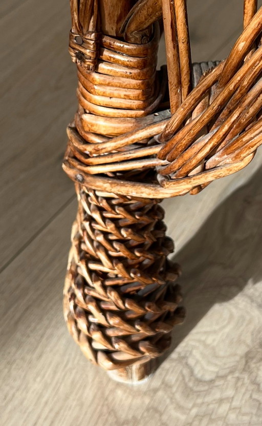 Fauteuil tressé Pierre Frey avec coussin