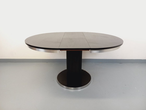 Image 1 of Table ronde de repas vintage en mélaminé esprit bois noir et métal chromé style Space Age / Diner des années 70 avec rallonge in
