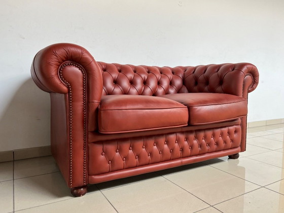 Image 1 of English Chesterfield Sofa Pair – Paprika Red Leather (Fully Restored, Rare Colour)