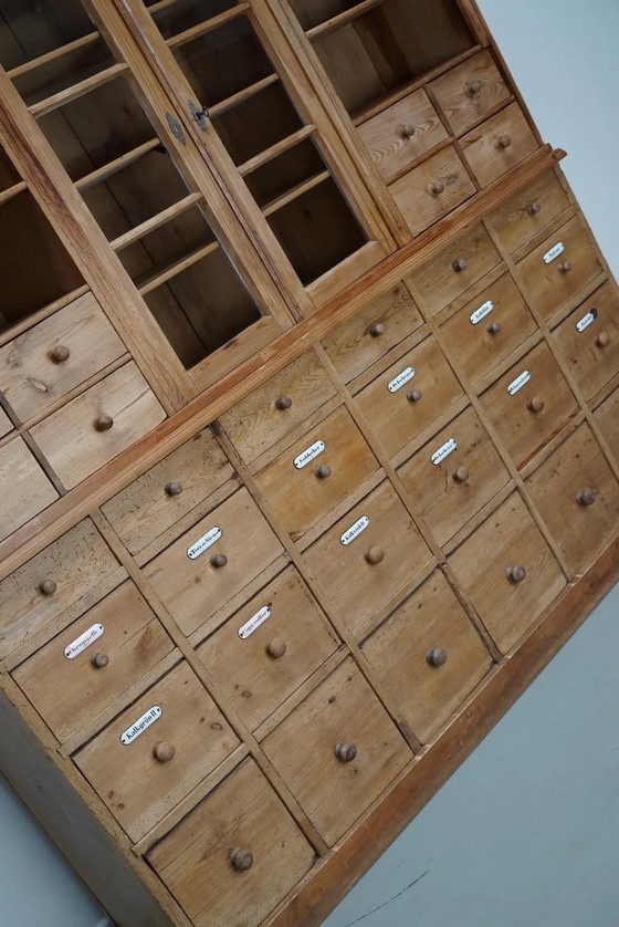 Image 1 of Large antique German apothecary cabinet / display cabinet in pine, early 20th century