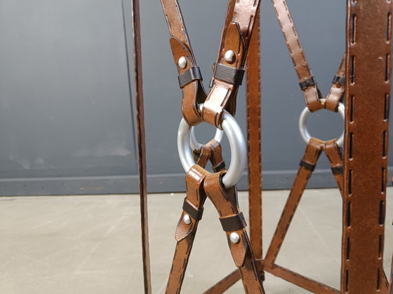 Image 1 of tavolino in ferro in ecopelle attribuito a jacques Adnet, anni '70