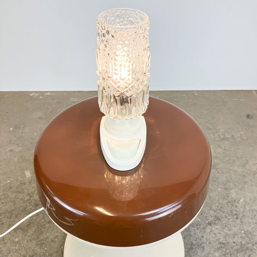 table lamp by SAKU, glass bag on plastic base, 1970s