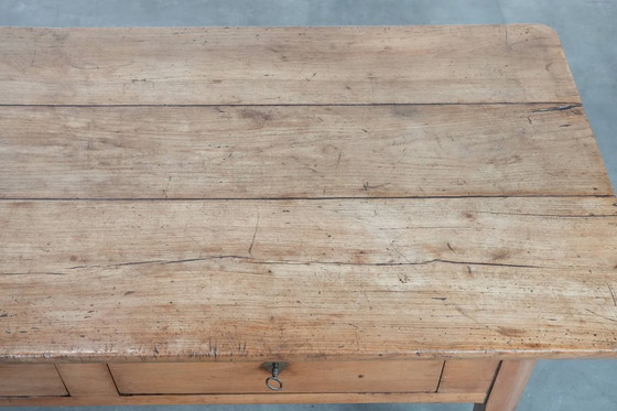 Image 1 of Antieke Franse salontafel gemaakt van vruchtenbomenhout uitgevoerd met twee lades