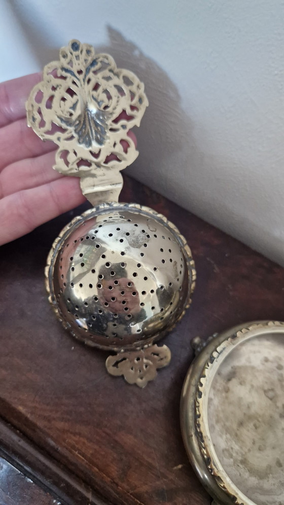 Image 1 of Antique tea strainer and drip tray. Silver-plated?
