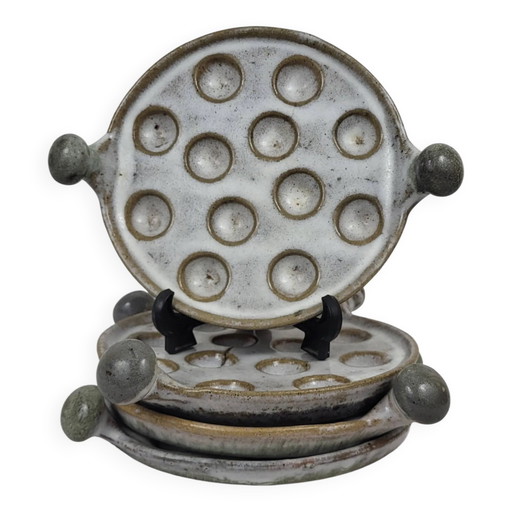 4 stoneware snail plates