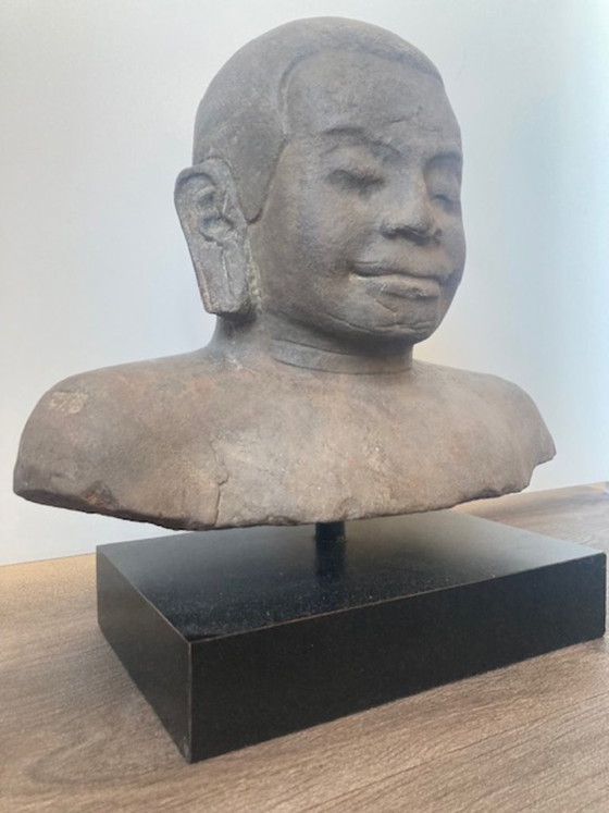 Image 1 of Sandstone bust of King Jayavarman VII of the Khmer Empire.