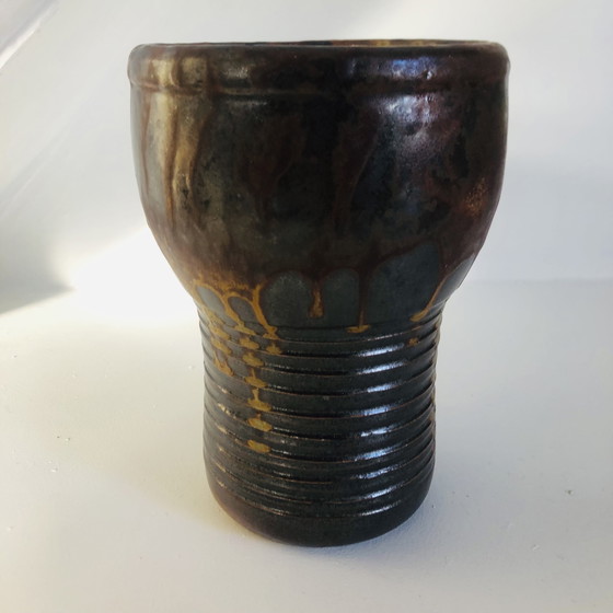 Image 1 of Vaso a torso in ceramica smaltata metallizzata