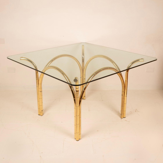Table de salle à manger italienne méditerranéenne en acier plaqué laiton effet bambou et plateau en verre (photo 11 of 21)