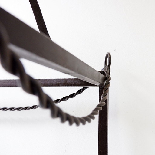 Vintage pagoda-style shelves in black metal