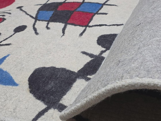 Alfombra de lana inspirada en Joan Miró – La sonrisa con alas llameantes - Alfombra Nómada – Wool (photo 9 of 9)