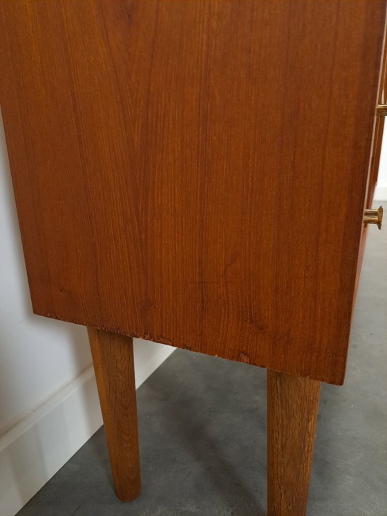 Image 1 of Deens teak vakkenkast met lades en hoge poten, vintage wandkast