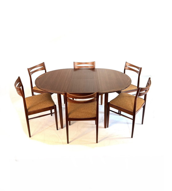 Image 1 of Vintage Rosewood extendable dining table '60