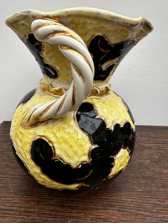 Image 1 of Vase boule jaune et noir rehaussé or attribué Vallauris h 20 cm