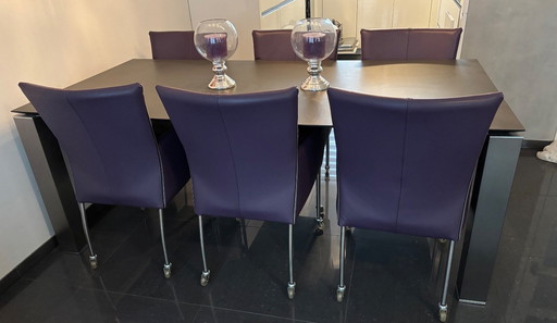 6x chaises design en cuir Lango - Aubergine avec roulettes en acier inoxydable et roulettes souples