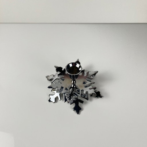 Silberner Schneeflocken-Kerzenhalter aus Metall