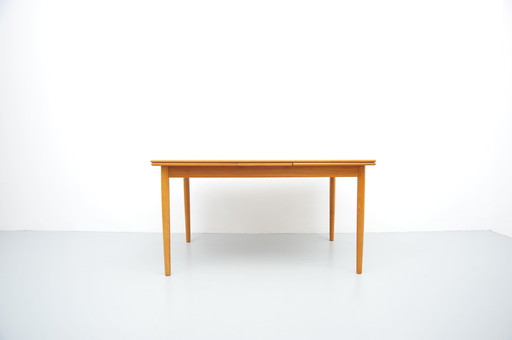 Extendable teak dining table from AR Mobler