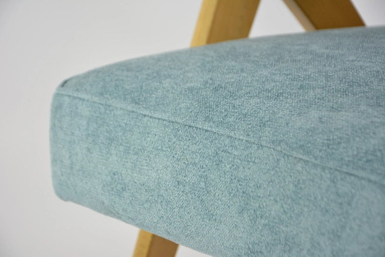 Image 1 of Poltrone KOMPAS in bouclé azzurro