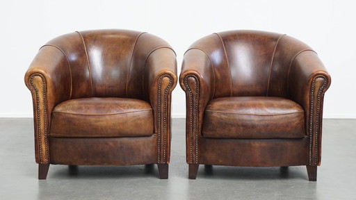 2x fauteuil club en peau de mouton