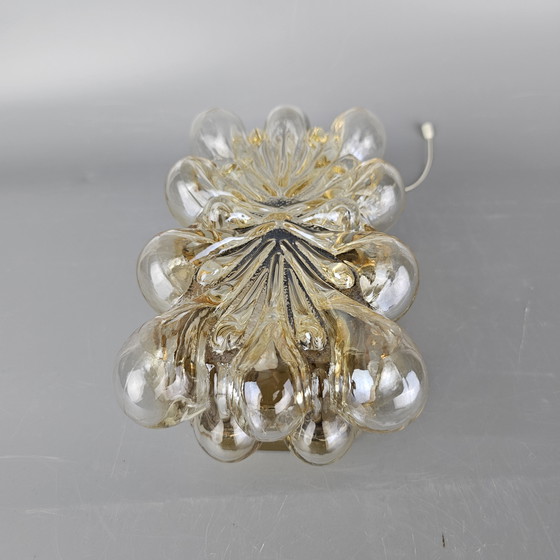 Image 1 of Vintage glass bubble wall lamp by Glashutte Limburg. Design by Helena Tynell. Glass and brass. 1960, Germany.