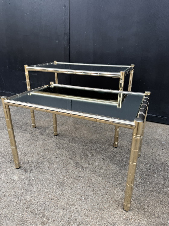 Image 1 of Nesting tables in gold-tone metal, bamboo, and mirror, 1970s style