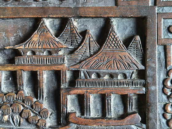 Image 1 of Antique Chinese chest with deep wood carving